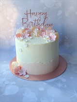 Pale pink buttercream birthday cake